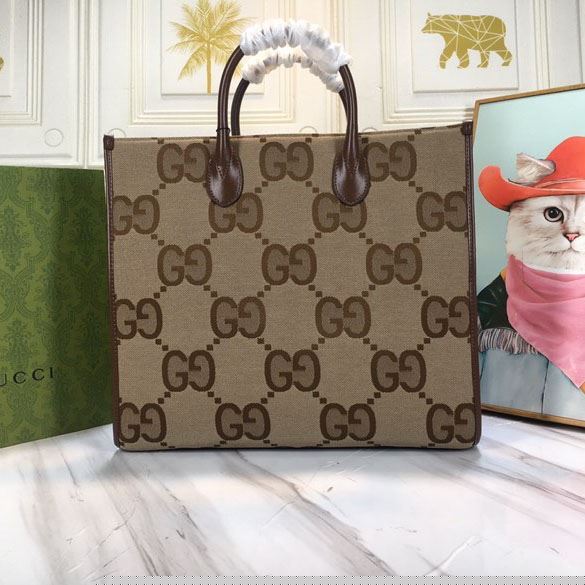 G*u*i shopping bags